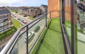 an apartment balcony with a view of a street at 1 Bedroom Cozy Apartment In Oostende in Ostend
