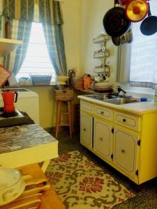 a kitchen with a sink and a counter top at Porta del Sol ~Less than 1 m to center of town! in San Germán