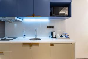 A kitchen or kitchenette at Changsha Zealandia Serviced Apartment