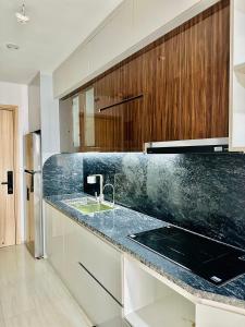 Kuchyň nebo kuchyňský kout v ubytování Homestay Bim 30T Hạ Long Quảng Ninh