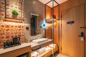 Um banheiro em Qiuguo Hotel - Beijing Chaoyang Branch
