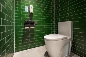 Um banheiro em Qiuguo Hotel - Beijing Chaoyang Branch