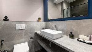 Koupelna v ubytování AV apart hotel + 29 fotografií