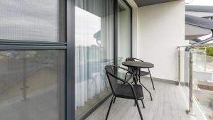 Balkón alebo terasa v ubytovaní AV apart hotel