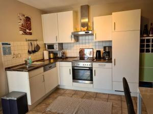 ครัวหรือมุมครัวของ "Moseltor" Comfortable holiday residence +33 ภาพ