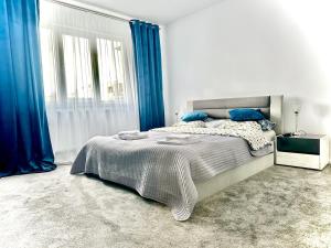 Postel nebo postele na pokoji v ubytování Ayan Studio