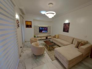 A seating area at Victoria Heights Apartment