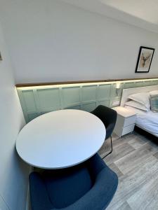 Postel nebo postele na pokoji v ubytování 9 Sheraton Apartments