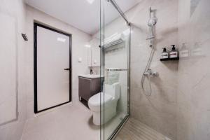 Phòng tắm tại Xi Ke Executive Apartment - Shenzhen Futian Exhibition Center