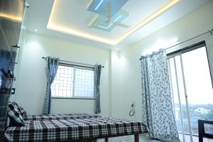 Krevet ili kreveti u jedinici u okviru objekta Gurumauli Guesthouse
