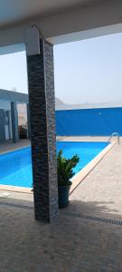 a view of a swimming pool in a house at Residência Águia in Praia