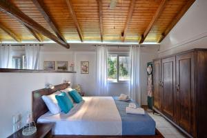 Ένα ή περισσότερα κρεβάτια σε δωμάτιο στο Little Red in Green