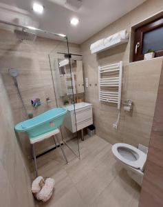 Ванная комната в Dénár Apartman