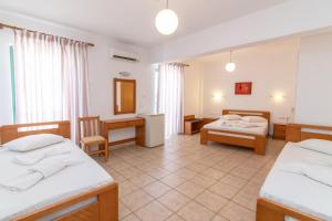 Postel nebo postele na pokoji v ubytování Ageri Hotel