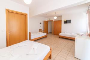 Postel nebo postele na pokoji v ubytování Ageri Hotel