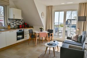 Kuchyň nebo kuchyňský kout v ubytování ILEX Appartements