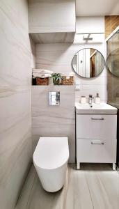 Ένα μπάνιο στο Przytulny Apartament - Centrum