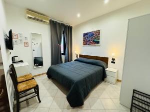 Voodi või voodid majutusasutuse Hotel Duca di Tromello toas