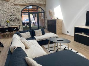 Posezení v ubytování L’ atelier de Lulu, gîte pour 6 personnes