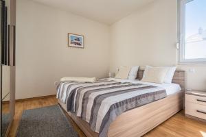 Voodi või voodid majutusasutuse AP 6+2 in one of the most luxury building in Omis toas