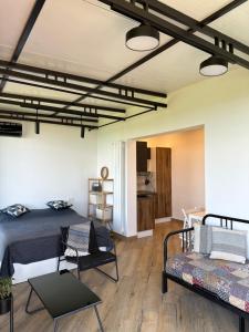 Postel nebo postele na pokoji v ubytování Agora Sundeck Tsikhisdziri