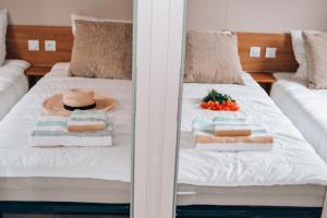 Кровать или кровати в номере Bungalow - Camping de la plage