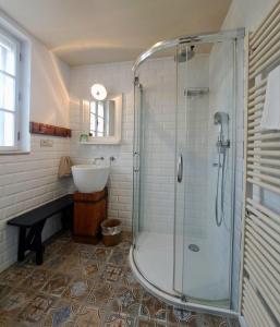 a bathroom with a shower and a sink at Matějovec38 in Český Rudolec