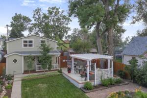 a house with a backyard with a gazebo at 3BR DOWNTOWN - NEW Hot Tub - Olympic Training Center in Colorado Springs