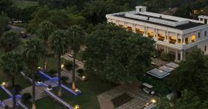 an overhead view of a building with trees and lights at The Golkonda Resort and Spa in Hyderabad