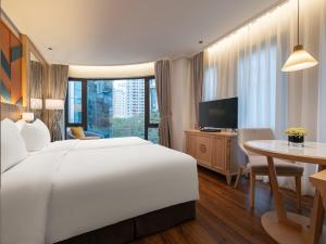 TV a/nebo společenská místnost v ubytování Saigon Aroma Hotel