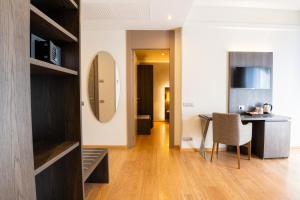 Кухня или мини-кухня в Hotel Como
