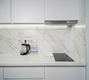 Апартаменты в Аркадии - Arcadia Sky Apartments的厨房或小厨房