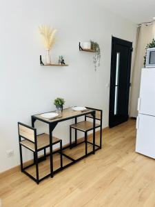 Kuchyň nebo kuchyňský kout v ubytování Studio cosy