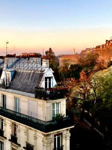 a view of a building with a roof at Amazing Sacre-Coeur views in Montmartre in Paris
