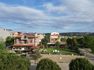 a group of buildings in a city with a street at Hotel Casa Villa in Eceabat