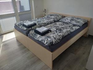 Postel nebo postele na pokoji v ubytování Apartmán na Vyhlídce