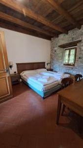 Postel nebo postele na pokoji v ubytování Cascina Belvedì