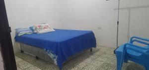 Postel nebo postele na pokoji v ubytování Casa Tazumal