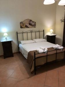 Postel nebo postele na pokoji v ubytování Villa Gabriella