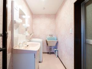 a bathroom with a sink and a toilet in it at Shinjuku/Okubo sta, 3 min walk/switch/board game/65㎡２LDK in Tokyo