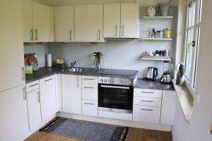 Kuchyň nebo kuchyňský kout v ubytování Ferienwohnung am Hauptplatz