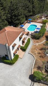 an aerial view of a house with a swimming pool at Villa Oleander in Chania Town
