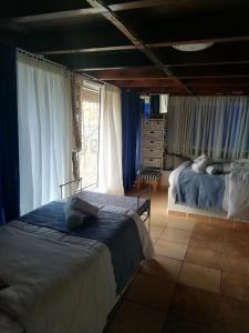 Katil atau katil-katil dalam bilik di Kynosoura's sea view