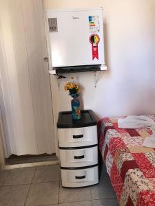 Postel nebo postele na pokoji v ubytování Cantinho da mery 1
