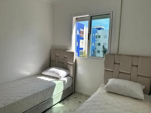 Letto o letti in una camera di Modern beach appartment in the heart of Martil