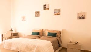 Letto o letti in una camera di Guest House Nonna Angela