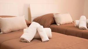 Letto o letti in una camera di Guest House Nonna Angela