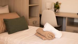 Letto o letti in una camera di Guest House Nonna Angela