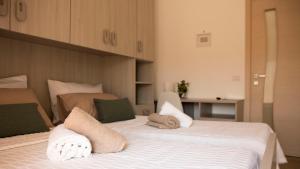 Letto o letti in una camera di Guest House Nonna Angela