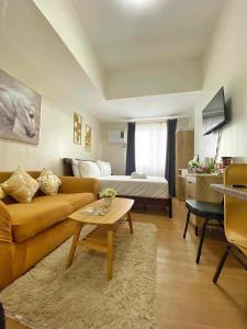 Μια τηλεόραση ή/και κέντρο ψυχαγωγίας στο The Loop Condominium